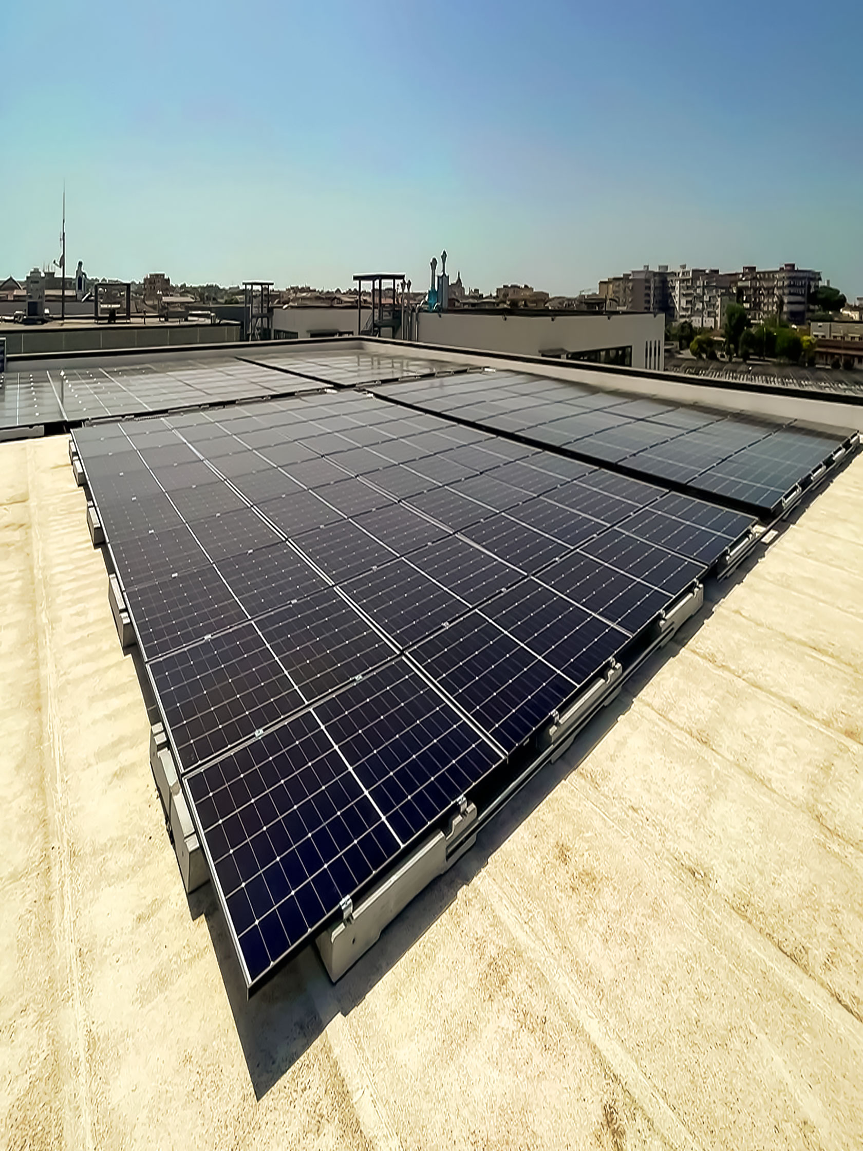 Impianto Fotovoltaico 65 kWp - Frattamaggiore, (Napoli) DMT Solar impianti fotovoltaici in tutta Italia residenziale e aziendale business, installatore certificato Tesla Powerwall e Sunpower Maxeon
