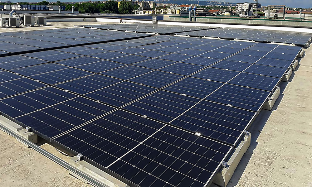 Impianto Fotovoltaico 65 kWp - Frattamaggiore, (Napoli) DMT Solar impianti fotovoltaici in tutta Italia residenziale e aziendale business, installatore certificato Tesla Powerwall e Sunpower Maxeon